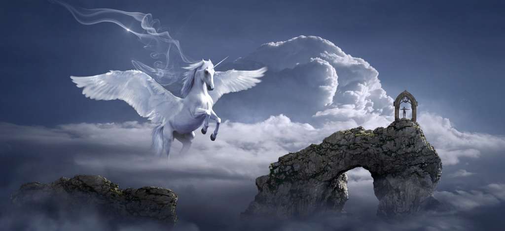 Un unicornio en las nubes y una persona en una montaña. La Asociación libre y el Significado de los sueños